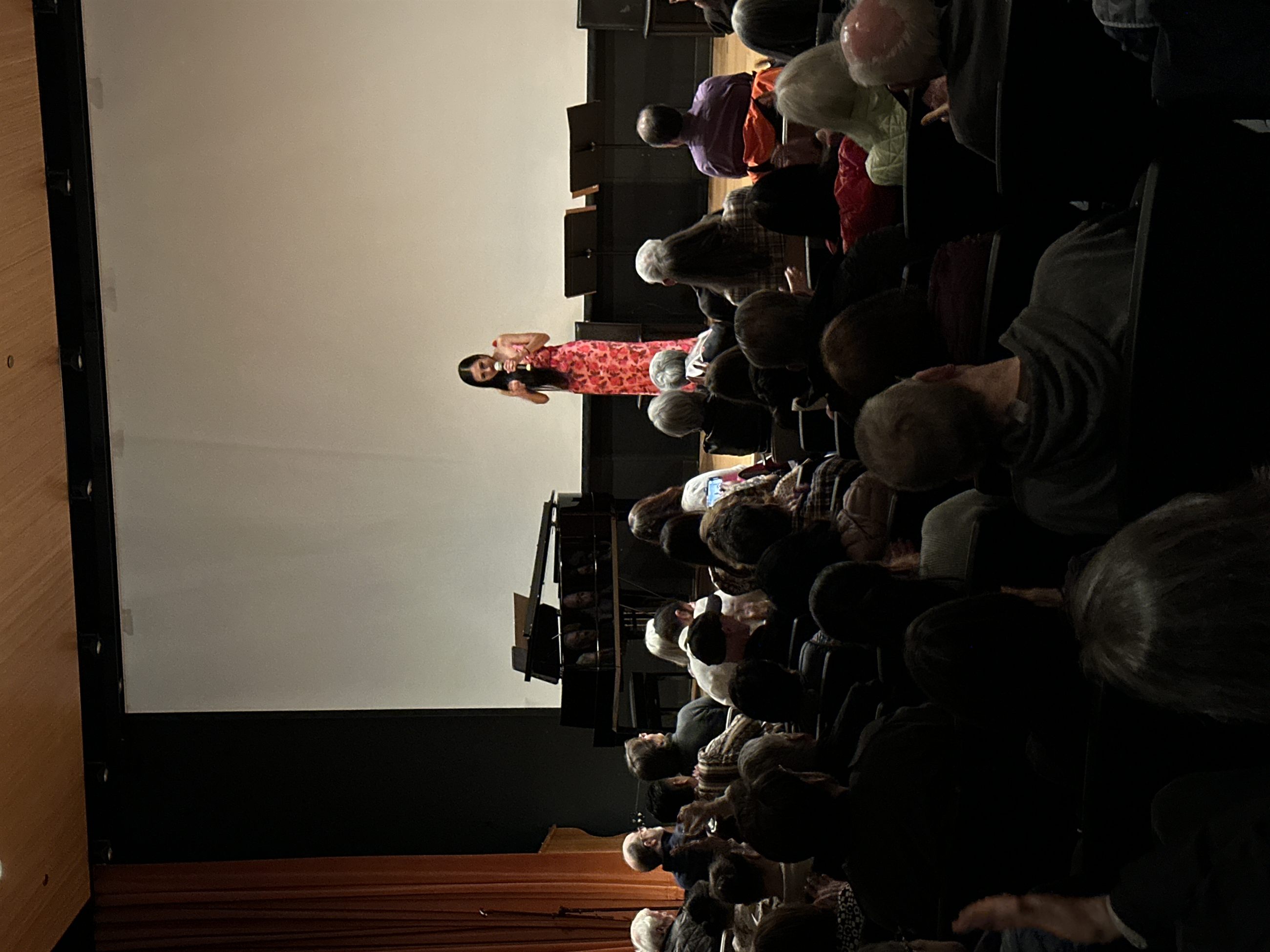 Storyteller on stage during Asian Monologues.