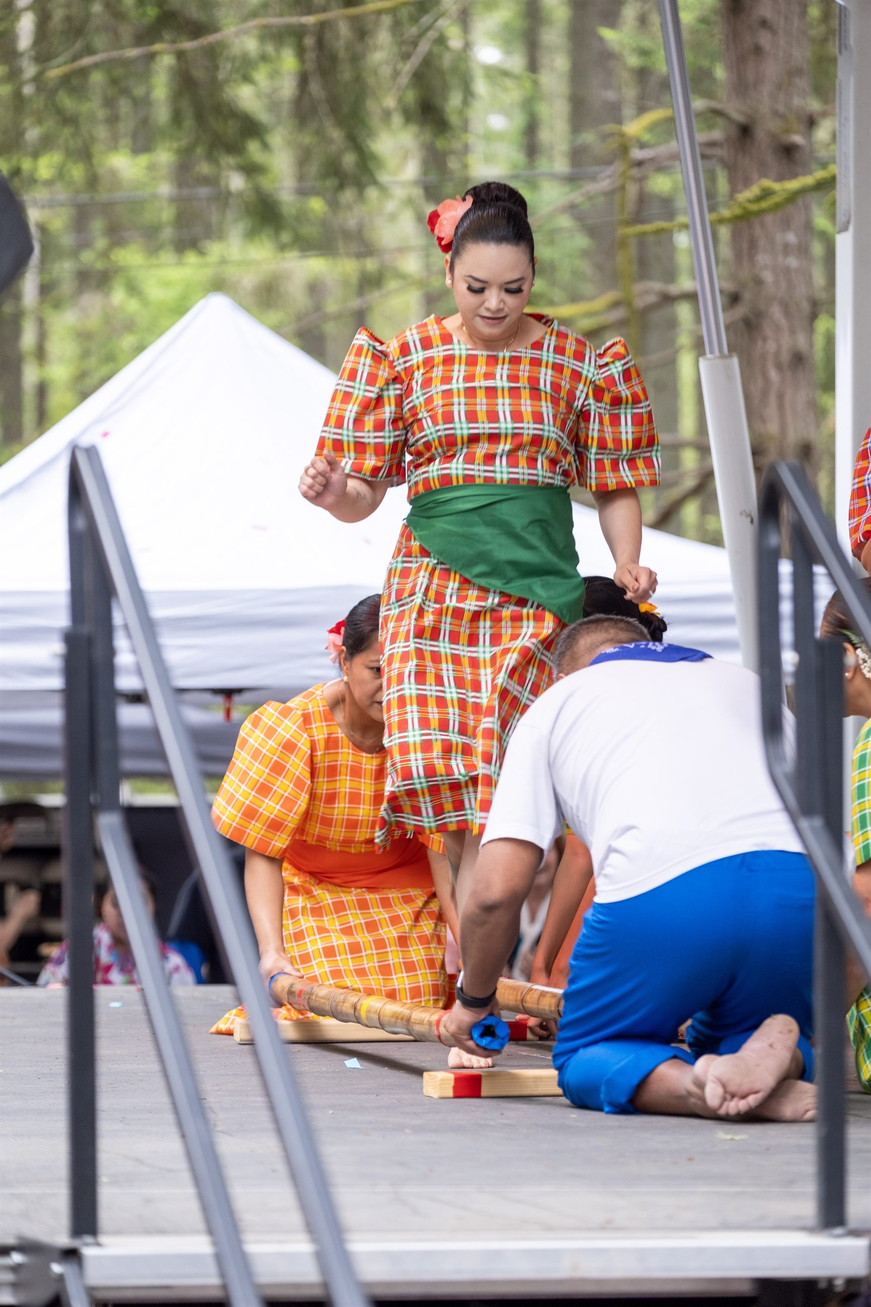 Students and emerging leaders contributing to festival hospitality and service.
