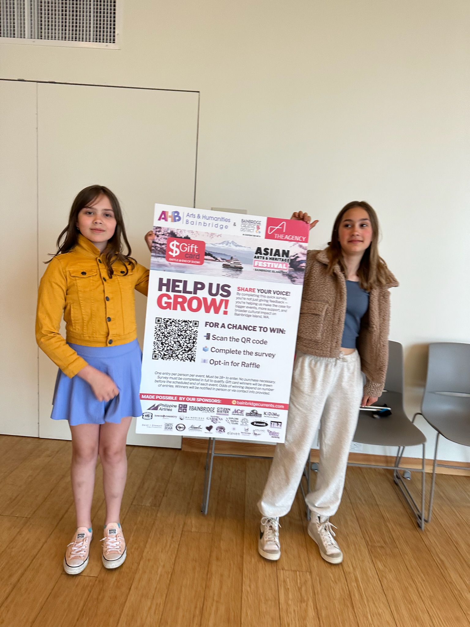 Volunteers and community members gathered together during a festival moment.